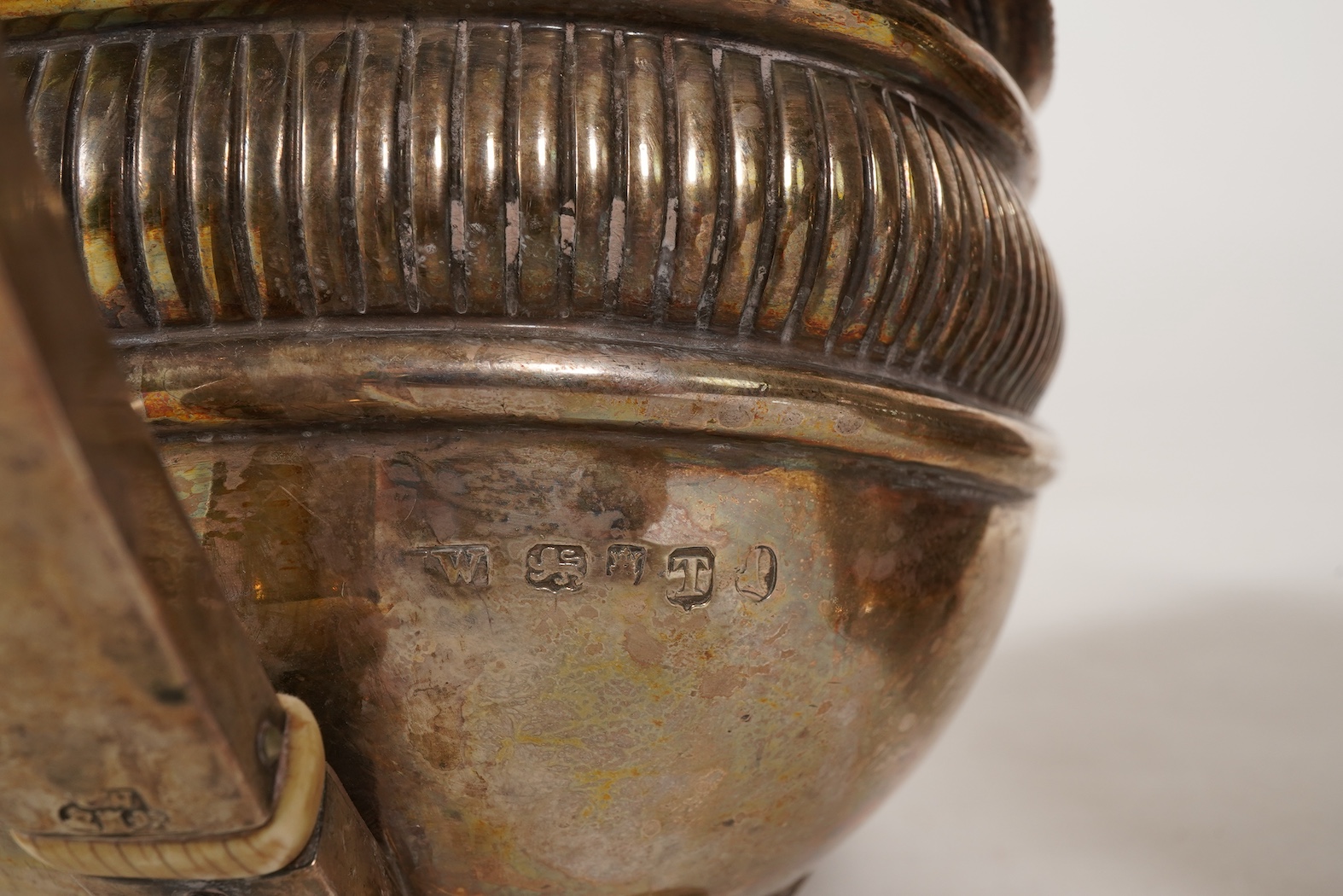 A George III silver three piece tea set, by John Wakefield